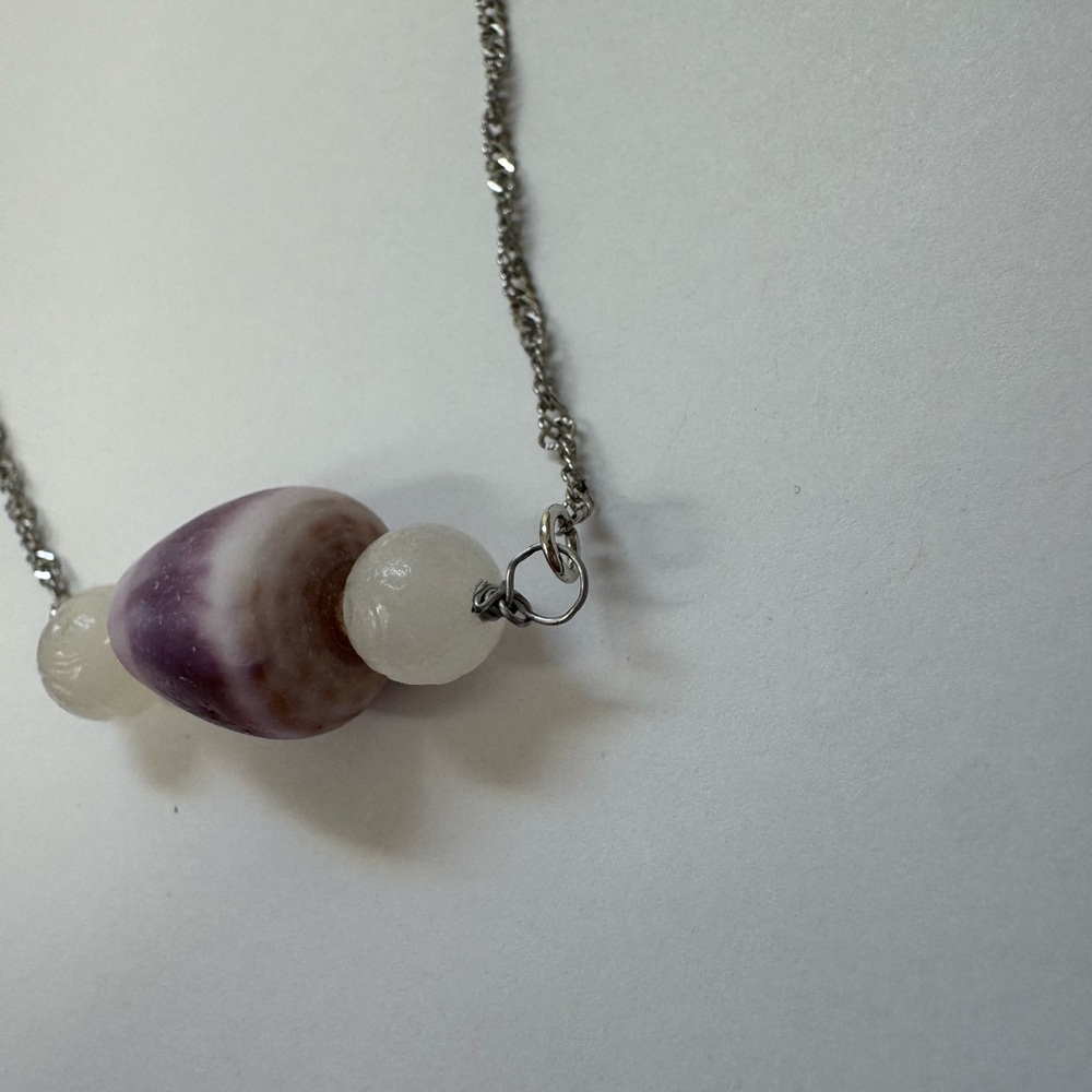 Handcrafted silver cone shell necklace with clear quartz beads